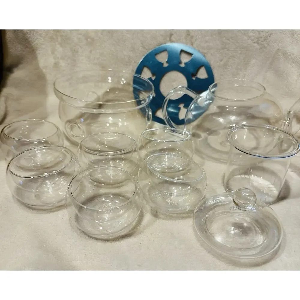 Shou Gong 27 oz glass filtering tea maker teapot with a warmer and 6 tea cups